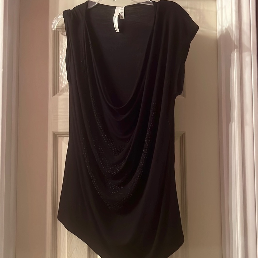 Cap sleeve black top with low rounded neck